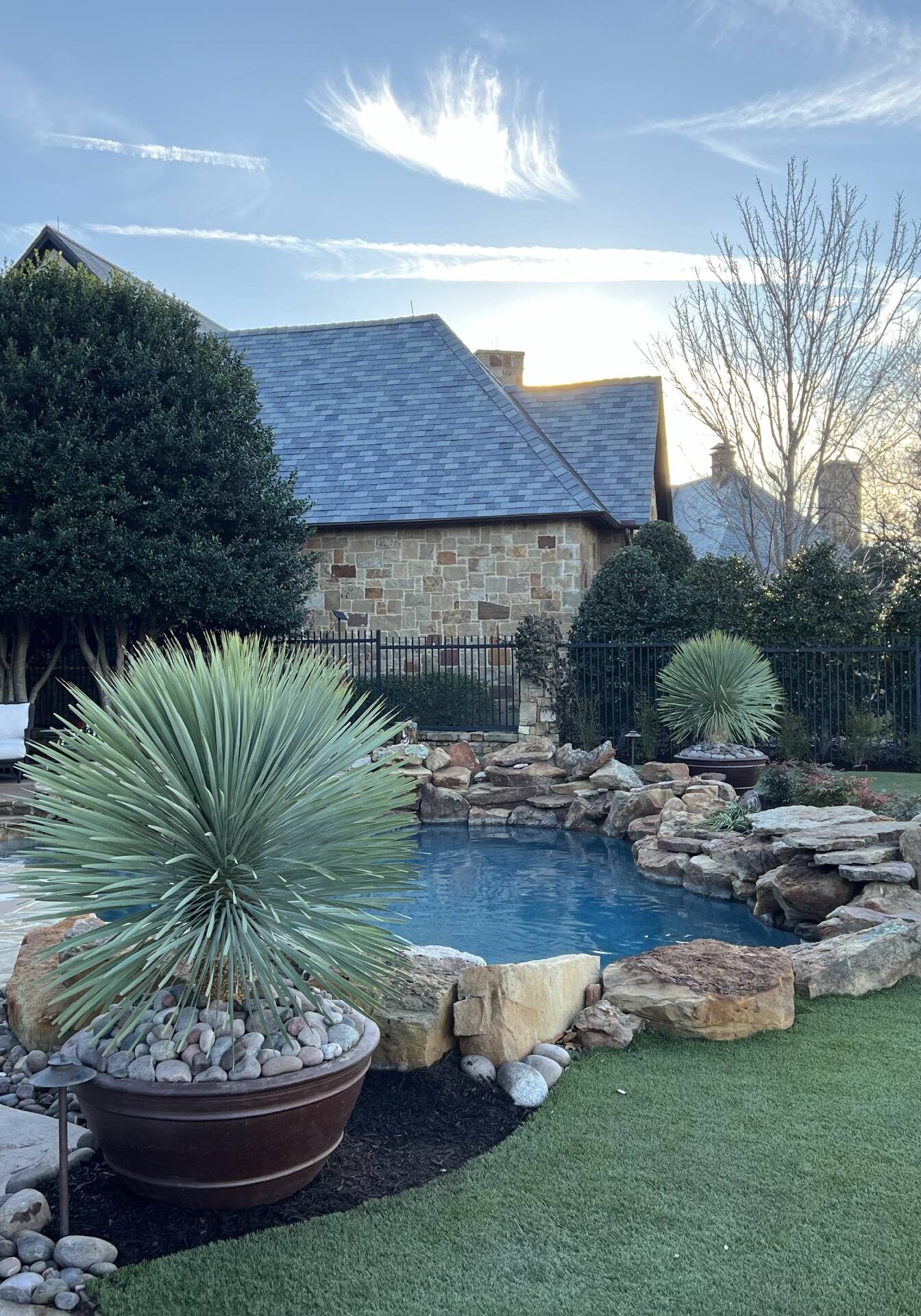 Outdoor Living, Pool Decking, Rock Work, Artificial Turf, Yucca Rostrata Planters
